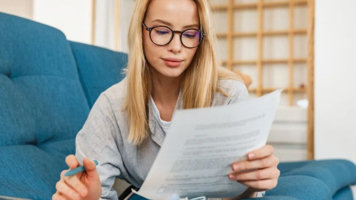 Tenant reading lease and understanding rights and responsibilities