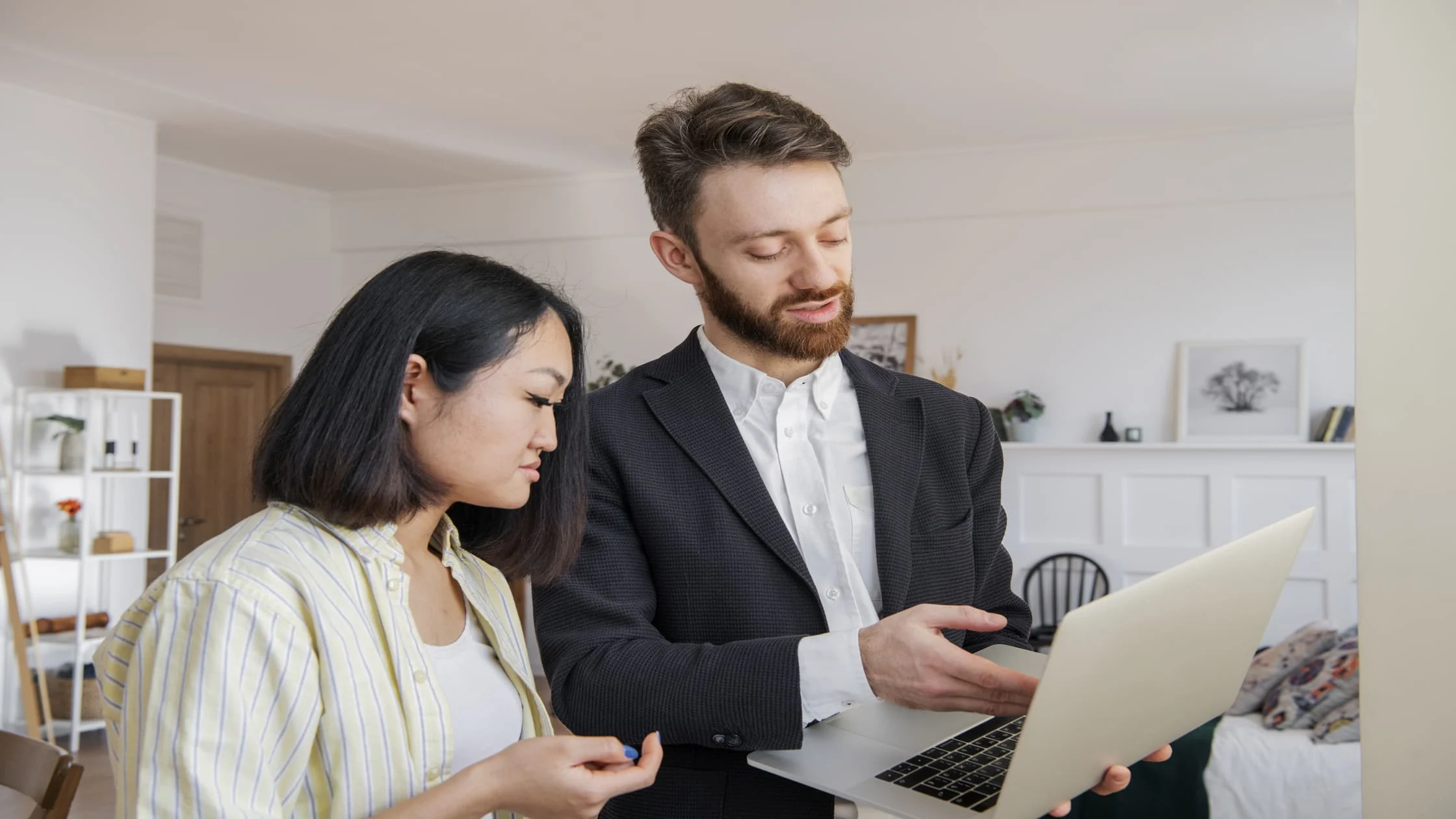 property-manager-discussing-tenant-privacy-and-legal-rental-inspection-rules-over-model-house